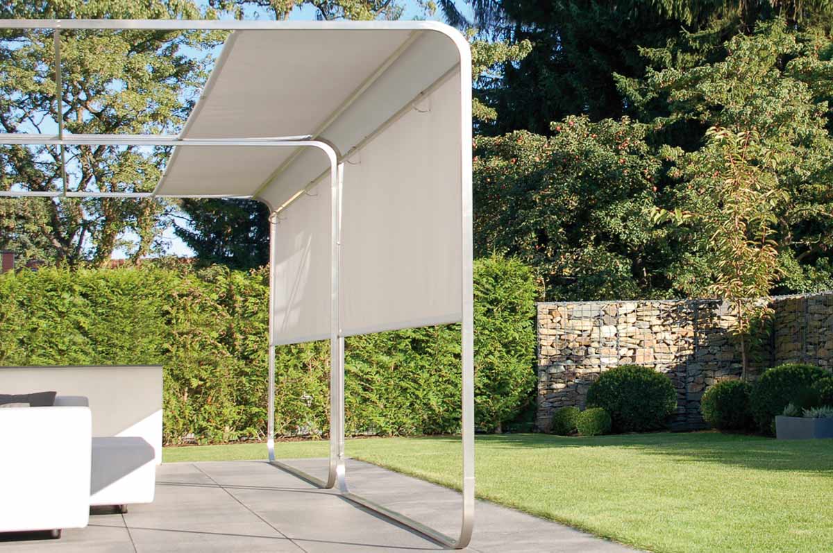 Roll-up balcony sun sail on terrace in garden